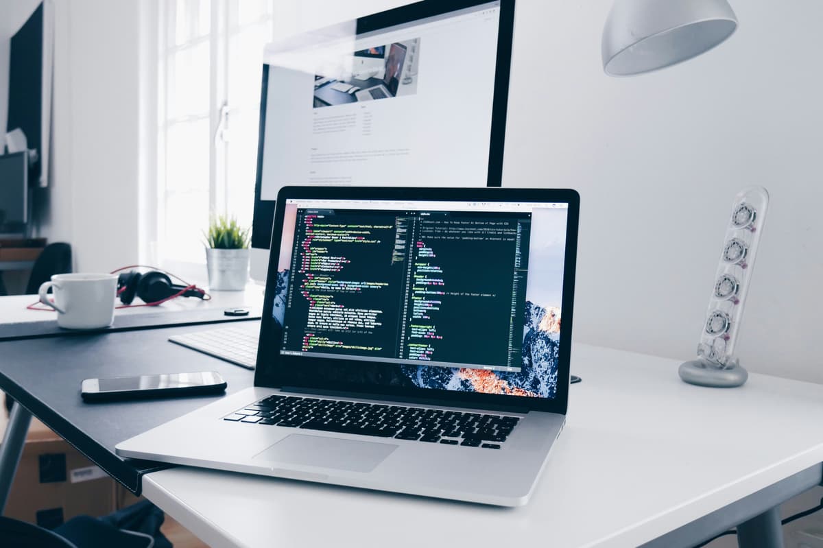 Modern software development workspace with coding environment